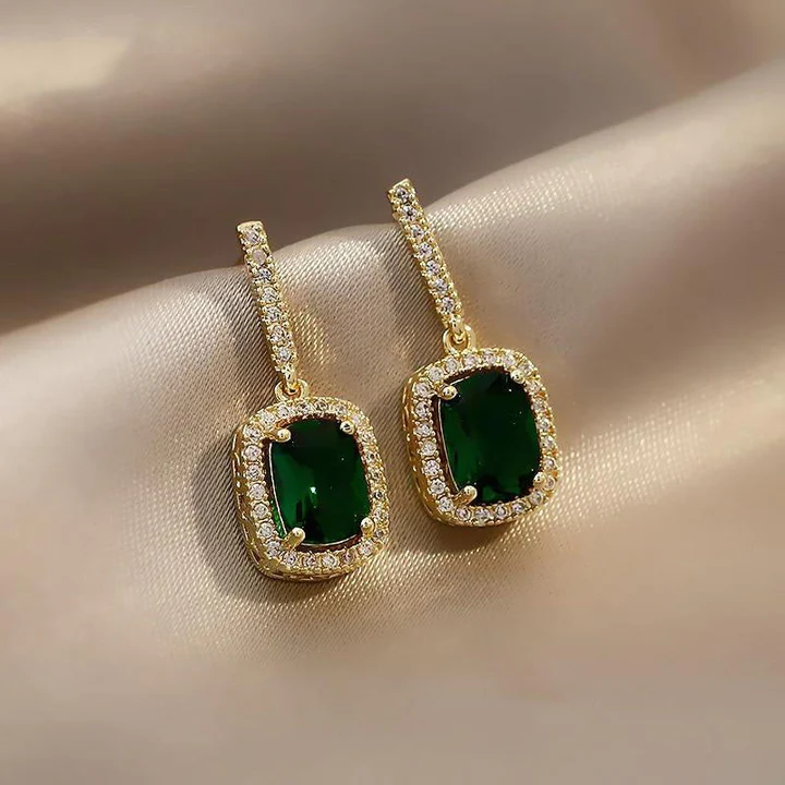Cercei eleganți cu cristale verzi strălucitoare